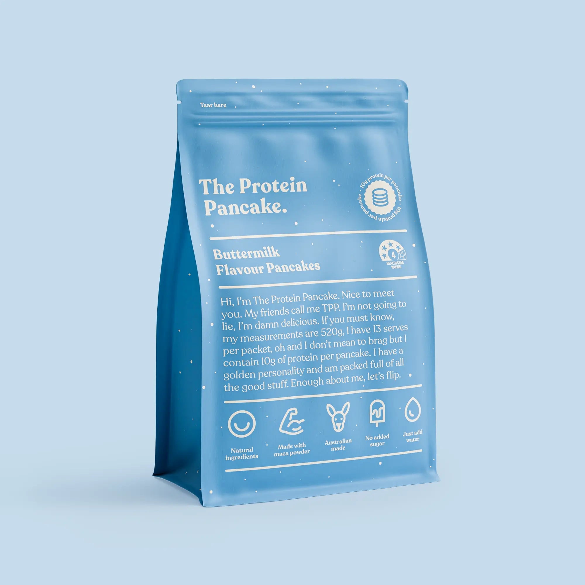 A blue protein pancake mix package with nutritional information and icons, against a blue background.